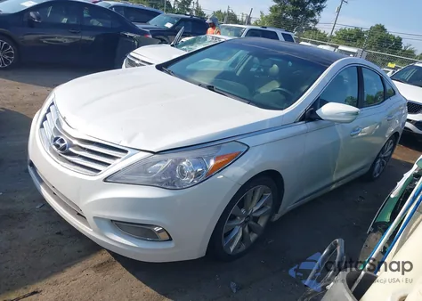 2013 Hyundai Azera z USA, uszkodzony, nr VIN KMHFH4JG1DA327914